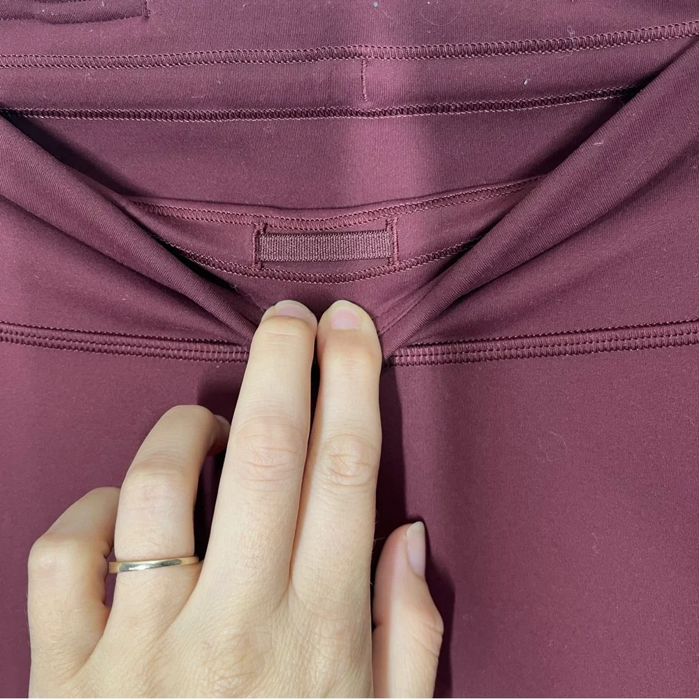 Lululemon Invigorate 25” maroon leggings - Picture 9 of 9